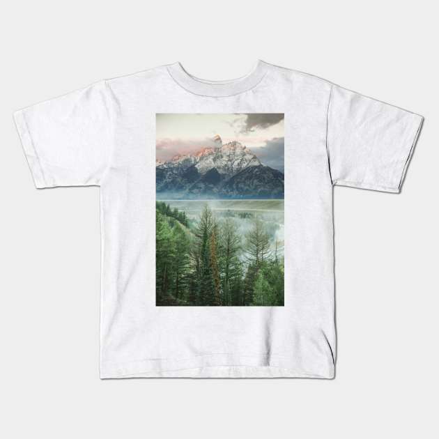 rocky mountain first light Kids T-Shirt by pholange